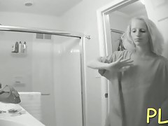 Hidden bathroom cam video of a blonde with tiny titties
