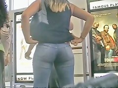 Non-nude voyeur video of a sexy girl filling up tight jeans