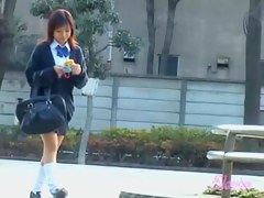 Asian babe gets embarrassing skirt sharking in a public park.