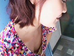 Lovely Japanese girl in a hot dress with nice decolete