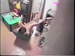 Woman caught masturbating in arm chair on hidden cam